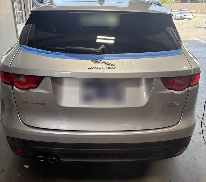 Rear glass work on a Jaguar F-Pace at the Nashville shop