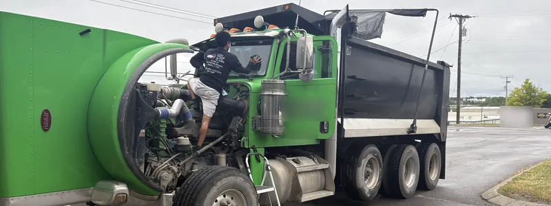 Windshield work on a commercial dump truck